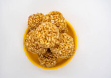 A plate of Murmura Murai Ladoo Puffed Rice in Jaggery Balls for Maghe Makar Sankranti Festival